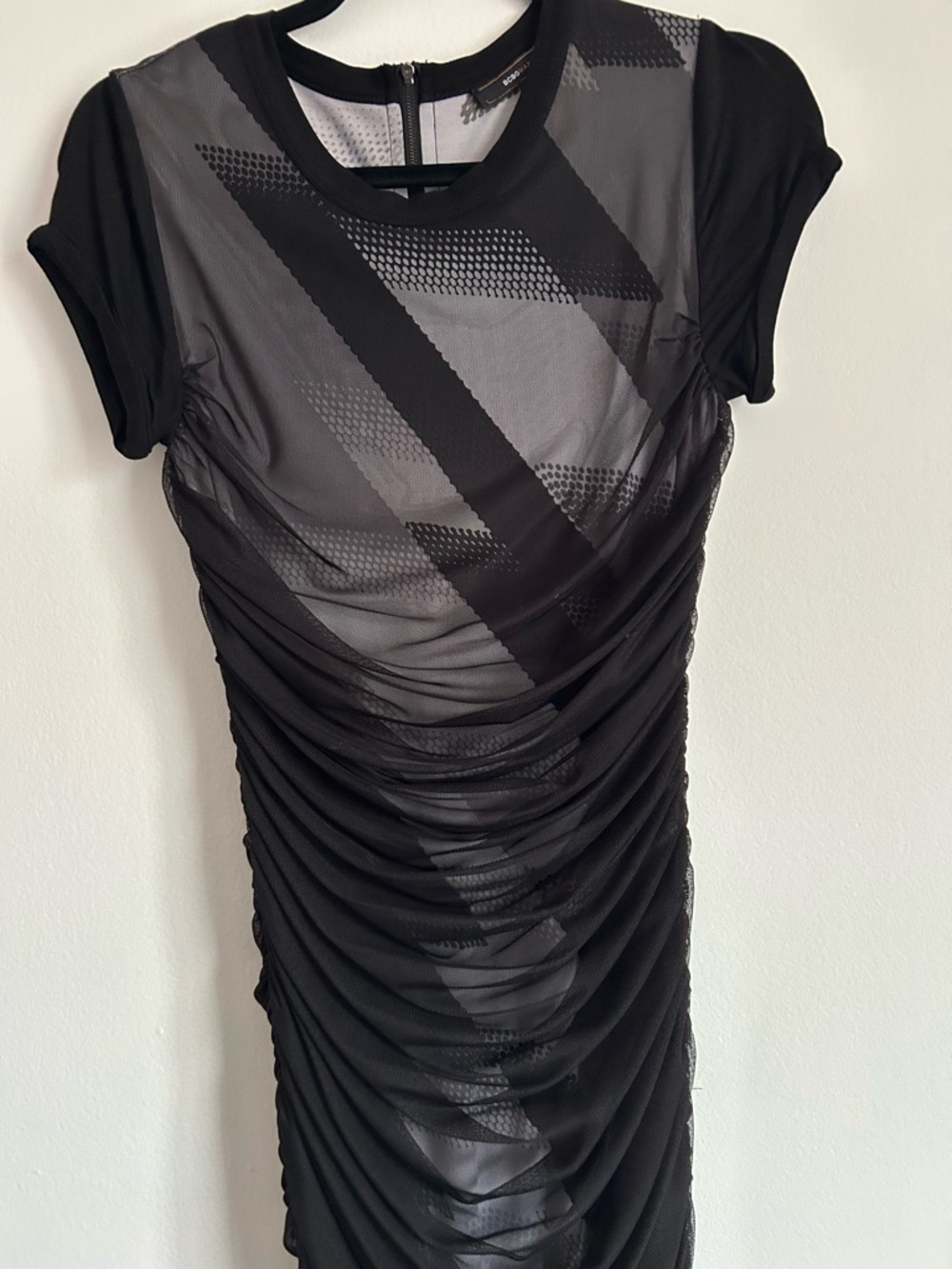 BCBGMaxAzria Black Ruched Sheer Overlay Midi hugs all the right places